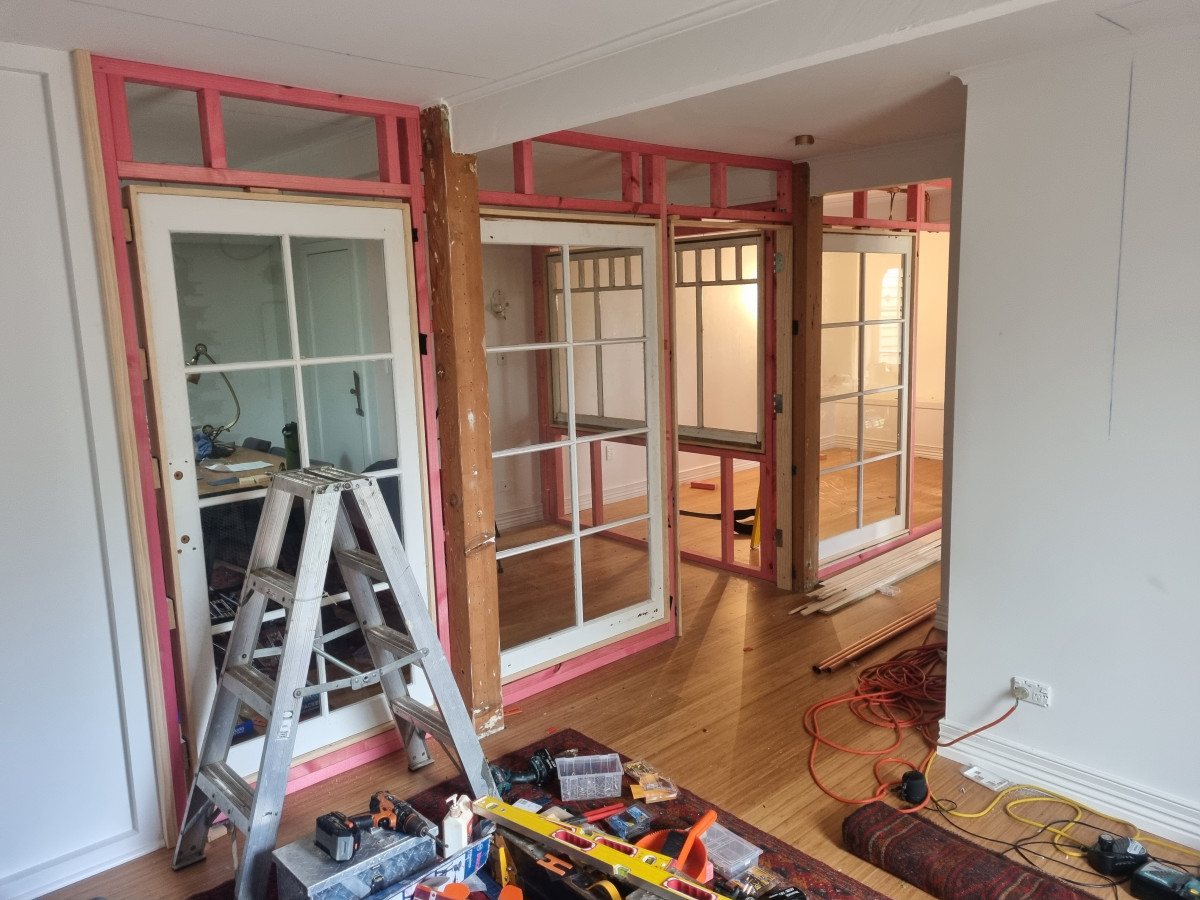 Interior renovation with French doors in pink timber framing